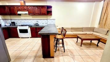 Fridge, oven, coffee/tea maker, toaster
