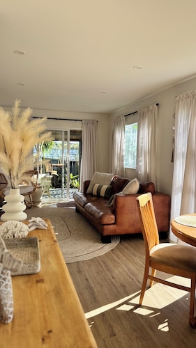 Your coastal escape. Walk to the beach. Private spa, whole house access.