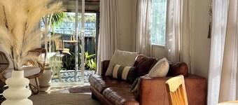 Your coastal escape. Walk to the beach. Private spa, whole house access.