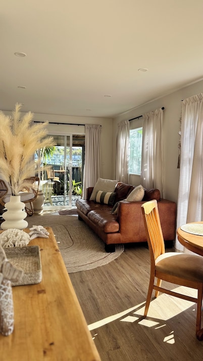 Your coastal escape. Walk to the beach. Private spa, whole house access.