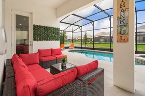 A heated pool - Epic 12BR Disney-Theme Lakefront Villa | Sleeps 30 (Kissimmee)