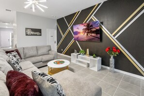 Smart TV, video games, DVD player, foosball