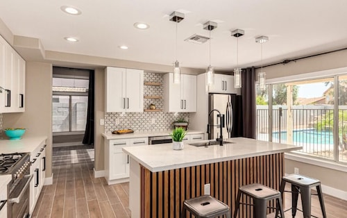Modern 4BR Escape w Private Pool, 3 mi to state farm stadium, dining & shopping!