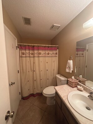 Hair dryer, towels, soap, toilet paper