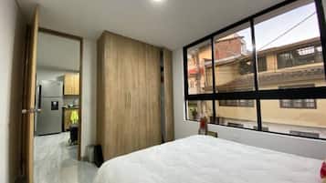 2 habitaciones, tabla de planchar con plancha, wifi y ropa de cama