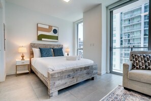 1 chambre, fer et planche à repasser, draps fournis