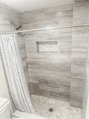 Shower, towels, soap, shampoo