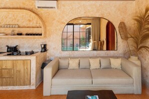 Vila conforto, vista para o jardim | Área de estar