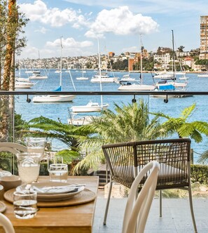 Outdoor dining - Peach Apartment at Palm View Collective (Elizabeth Bay)