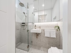 Shower, hair dryer, towels - Peach Apartment at Palm View Collective (Elizabeth Bay)