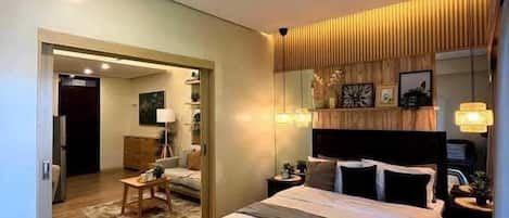 Deluxe Condo, City View | 1 bedroom, desk, laptop workspace, free WiFi