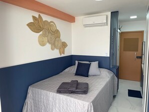 1 habitación, tabla de planchar con plancha, wifi y ropa de cama 