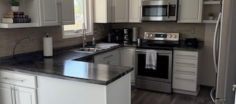 Charming 3 Bedroom 2.5 bathroom finished basement, Huge yard and Charcoal grill