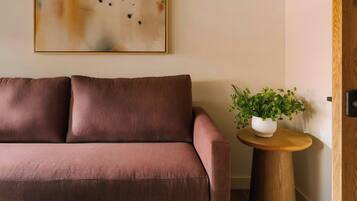 Suite, 1 King Bed with Sofa bed (Casita) | Living area | 50-inch flat-screen TV with cable channels