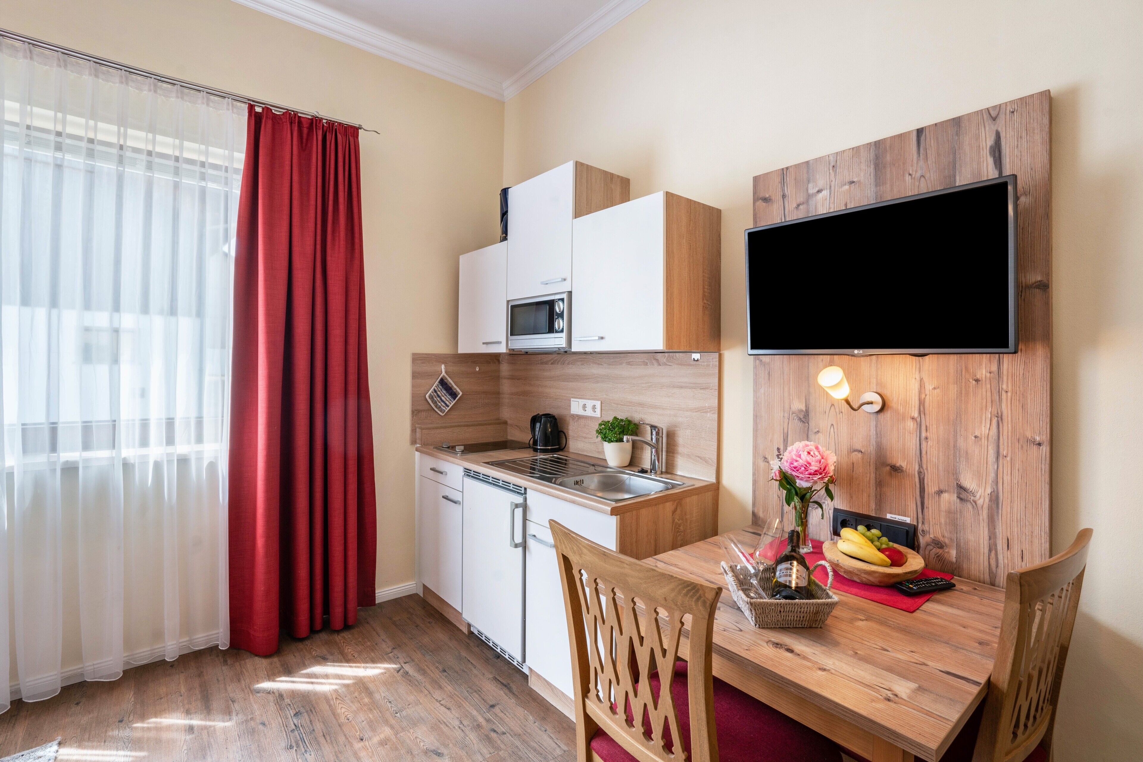 Fridge, microwave, stovetop, coffee/tea maker