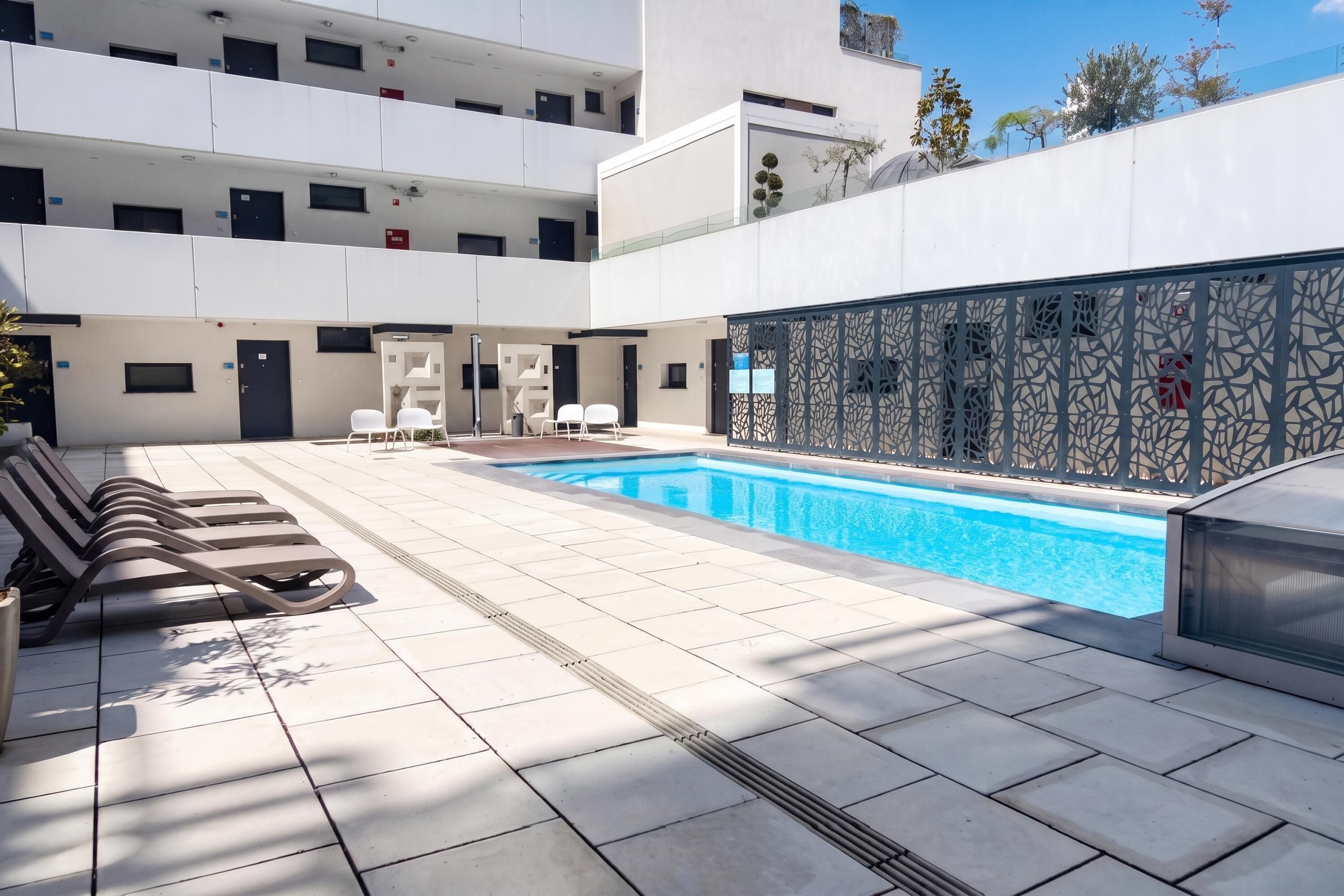 Departamento familiar, 2 habitaciones, balcón, junto al lago (Sunset Resort 409 With Pool) | Alberca | Alberca al aire libre por temporada 
