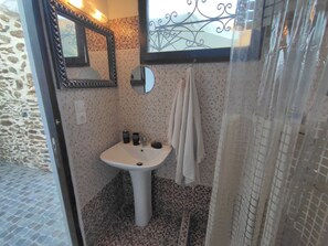 Shower, hair dryer, towels, soap