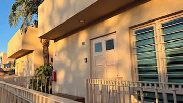 Signature Villa, Balcony, Courtyard View | 2 bedrooms, desk, laptop workspace, iron/ironing board
