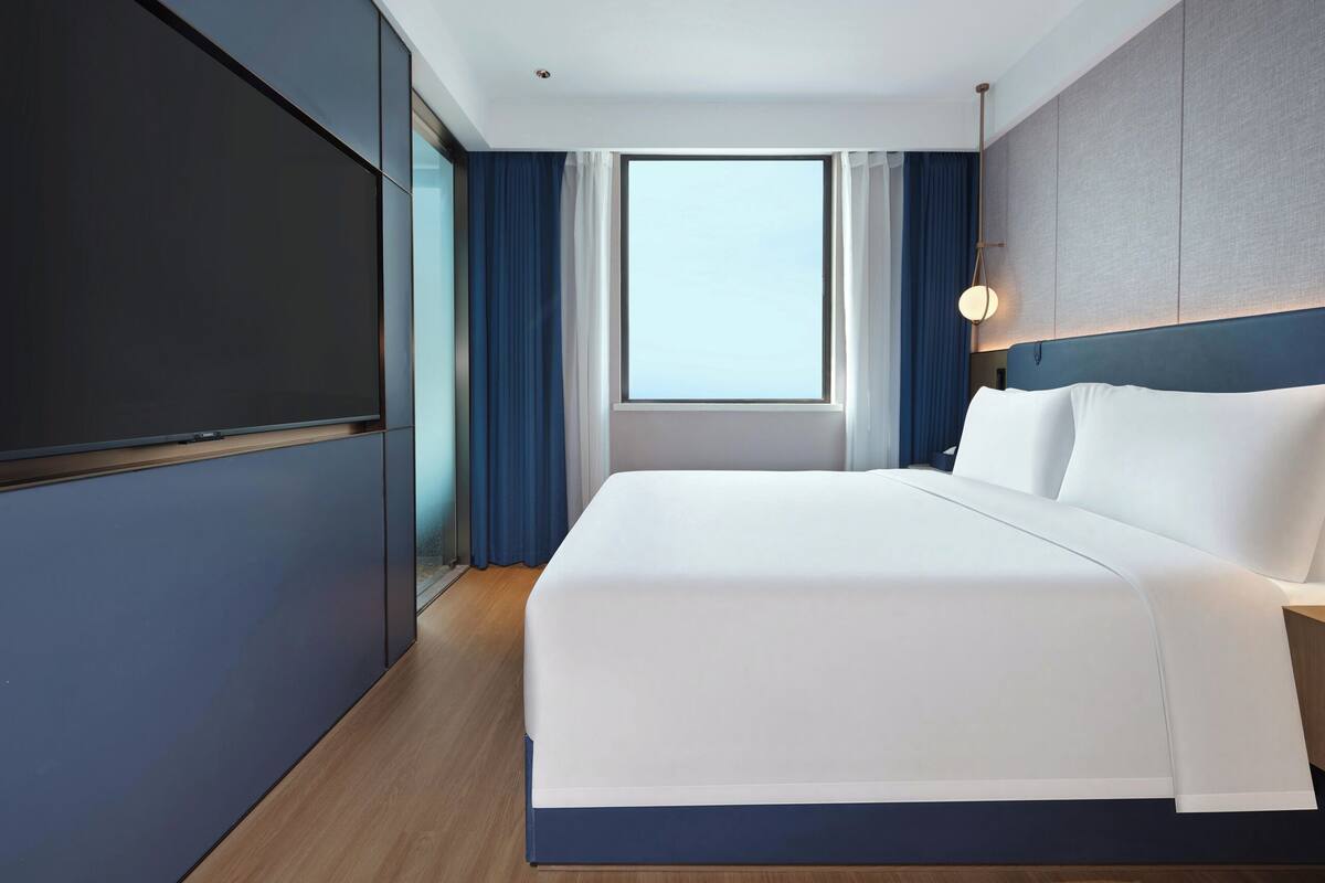 Habitación básica doble | Ropa de cama hipoalergénica y edredones de plumas