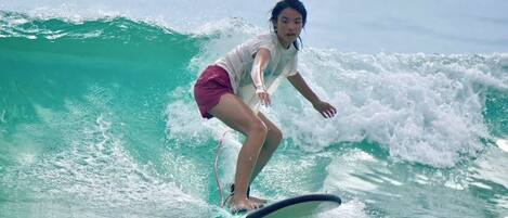 A person surfing on a wave.