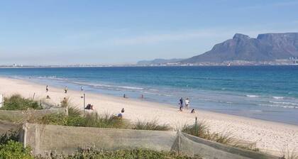 Spacious 6-bed 5 bath west beach house in charming Cape Town with WiFi