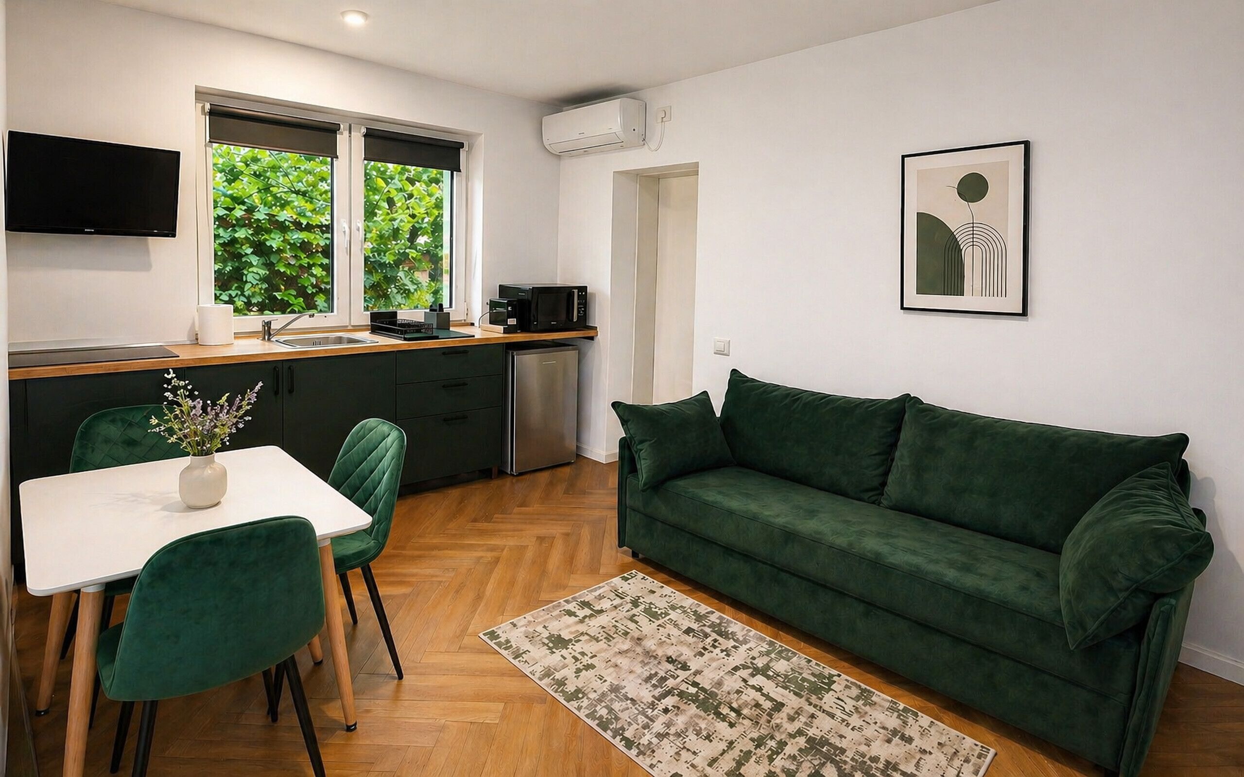 Deluxe appartement | Woonruimte | Een flatscreentelevisie