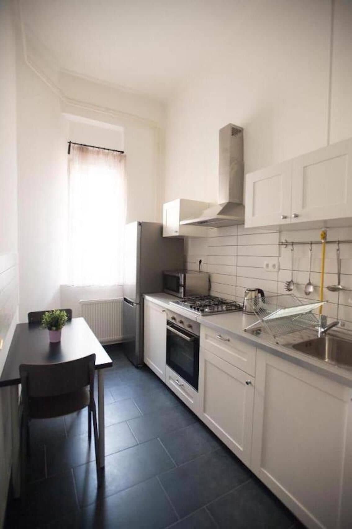 Superior Apartment | Private kitchen | Microwave, stovetop, cookware/dishes/utensils