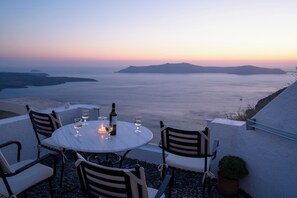 Deluxe Villa, Patio, Sea View | Outdoor dining - Lithies Traditional Homes (Firostefani Santorini)