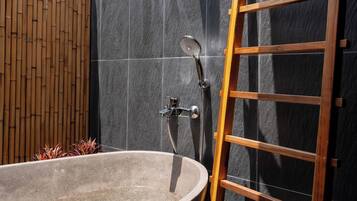 Separate bathtub and shower, hair dryer, towels, soap