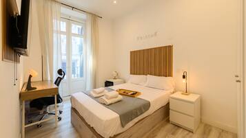 1 slaapkamer, een kluis op de kamer, een strijkplank/strijkijzer