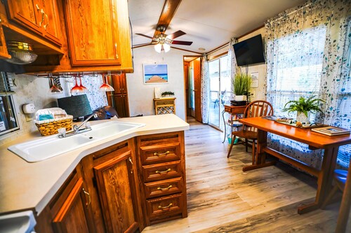 Lakeside Place 1 (Sleeps 1-6) - Tiny living space with a queen bed, and 3 twin beds perfect for kids