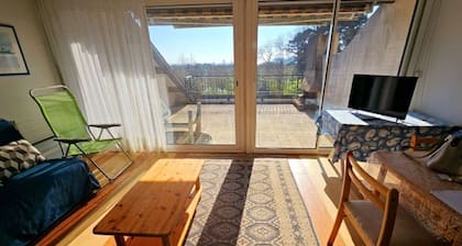 4-person apartment overlooking wooded park