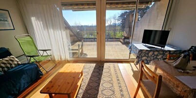 4-person apartment overlooking wooded park