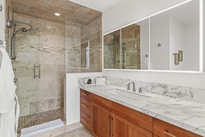 Shower, hair dryer, towels