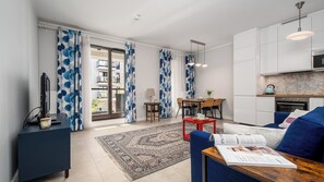 Apartamento (33) | Zona de estar | Una televisión de pantalla plana