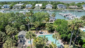Enjoy serene waterfront views and marina access from this luxurious property.
