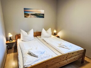 2 habitaciones, cuna de viaje, wifi gratis y ropa de cama