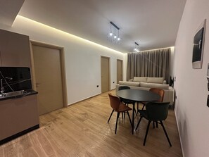 Apartment, Sea View | Living area | TV - Suites Kozi  (Sarande)