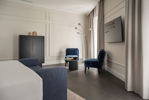 Suite | Premium bedding, down duvets, memory-foam beds, minibar