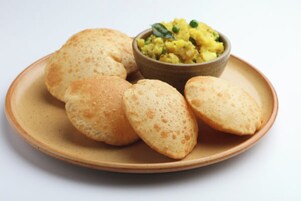 Desayuno continental diario (INR 150 por persona)