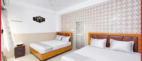 Chambre Quadruple Deluxe, climatisation | Vue de la chambre