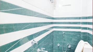 Shower, free toiletries, slippers, soap