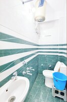 Shower, free toiletries, slippers, soap