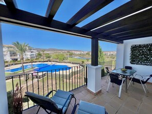 Outdoor dining - Stunning apartment with lovely pool and golf views (Sucina)