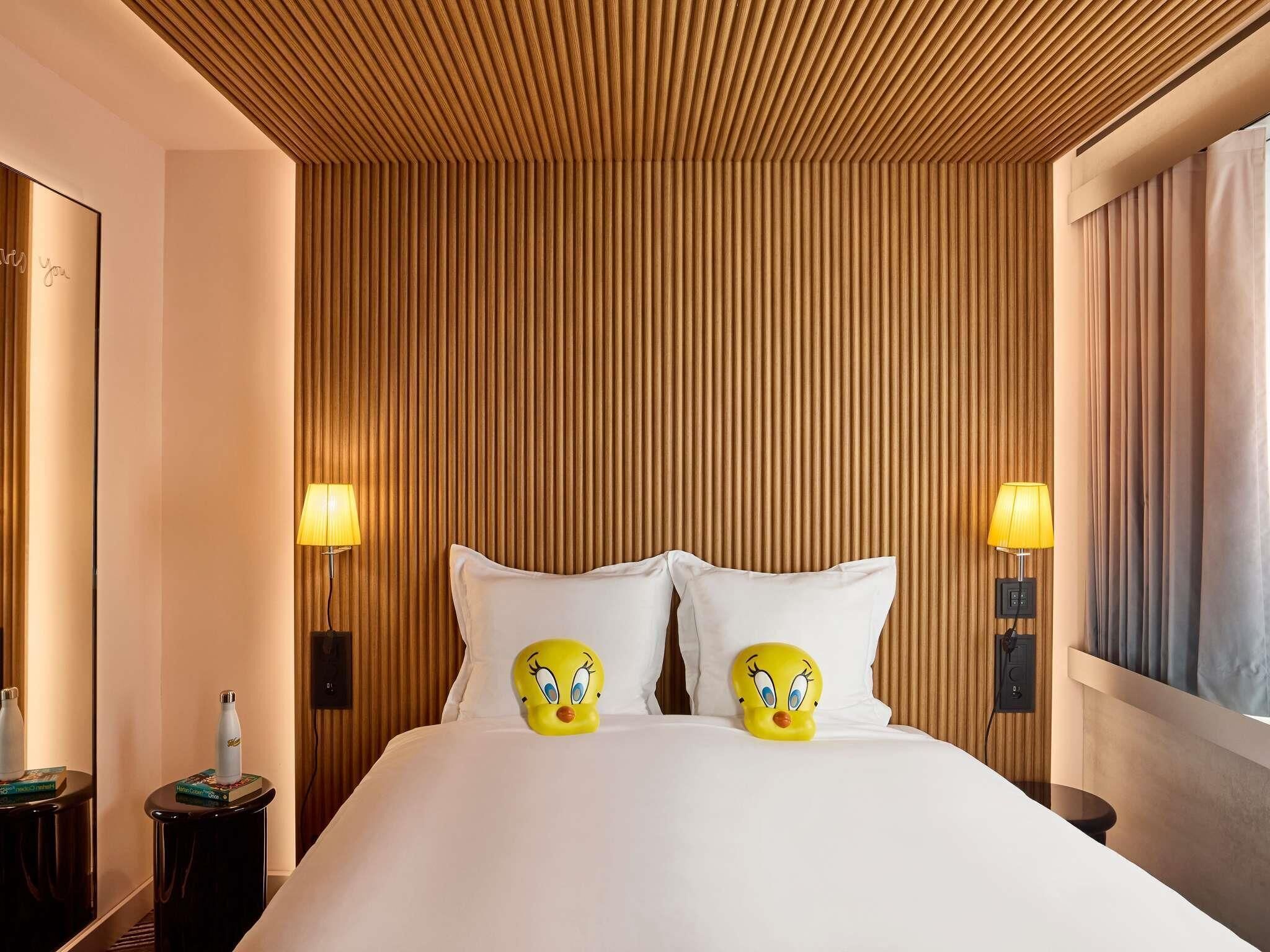 Down duvets, pillow-top beds, minibar, in-room safe