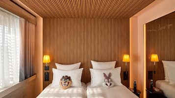 Donzen dekbedden, pillowtop-bedden, een minibar, een kluis op de kamer