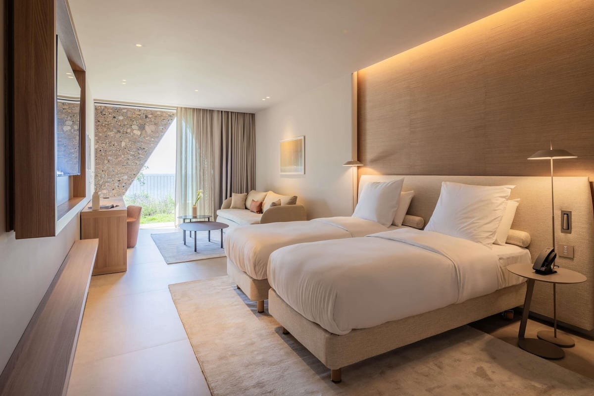 Deluxe Room, Multiple Beds | 1 bedroom, premium bedding, in-room safe, free WiFi
