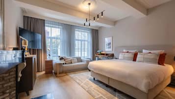 Deluxe Room, 1 Queen Bed | Premium bedding, minibar, in-room safe, individually decorated