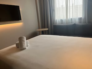 Desk, blackout curtains, soundproofing, iron/ironing board