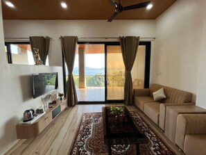 Lake View Luxury Suite | Living area | 21-inch LCD TV with digital channels, printers - Astoria Lagoon Resort (Igatpuri)